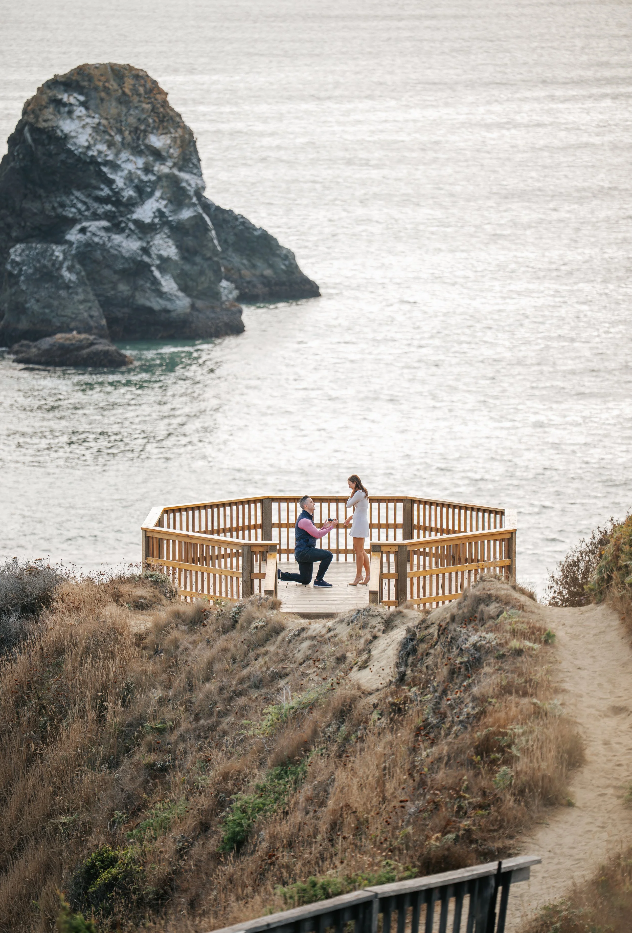 Surprise proposal at Trinidad, CA oceanside overlook in Humboldt County California by Tex Kelly Productions - scenic engagement photography with dramatic sea stack and ocean views