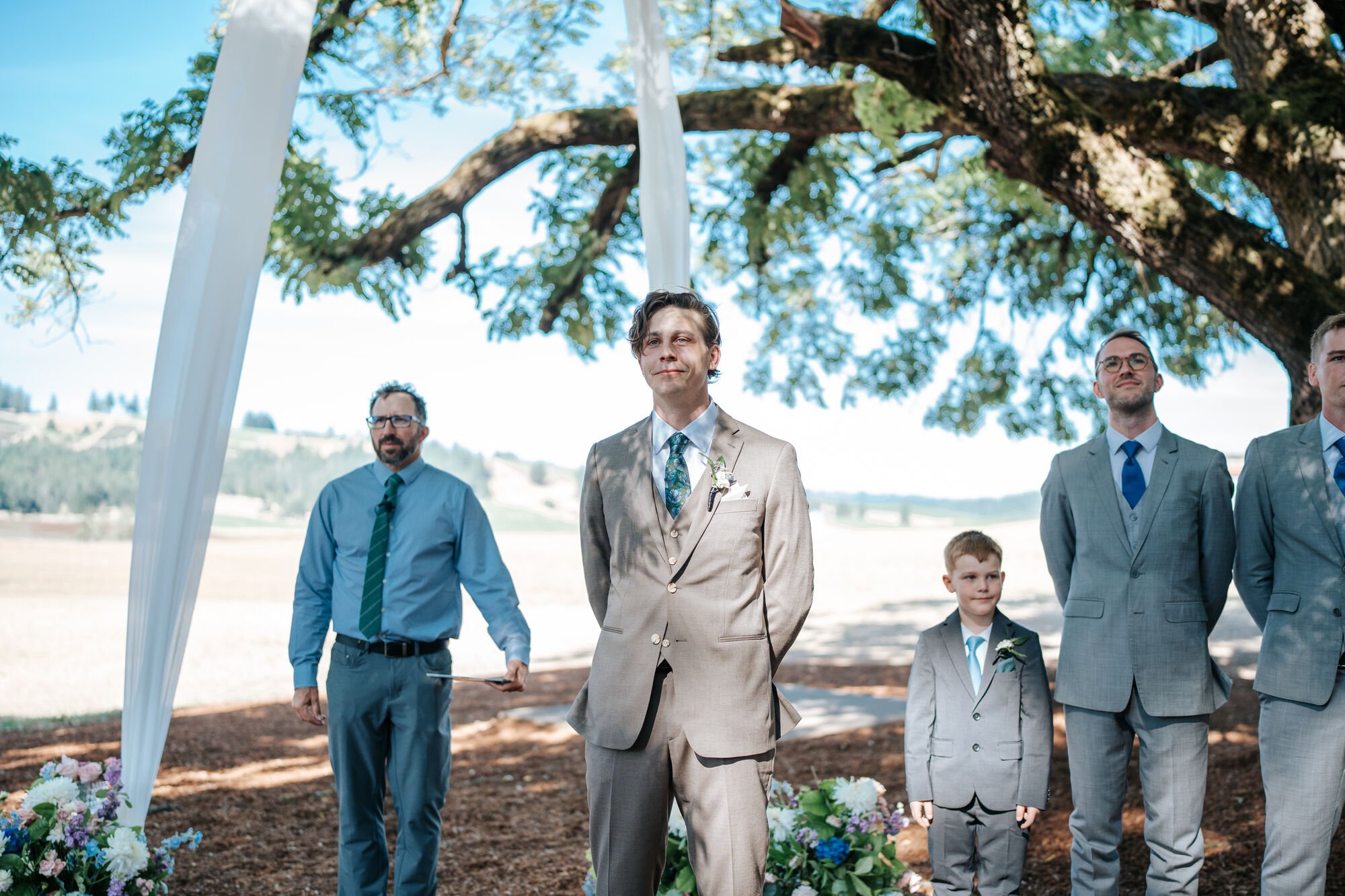 Groom stands ready to see his beautiful bride. Shot by Tex Kelly Productions, Humboldt County wedding photographer. 