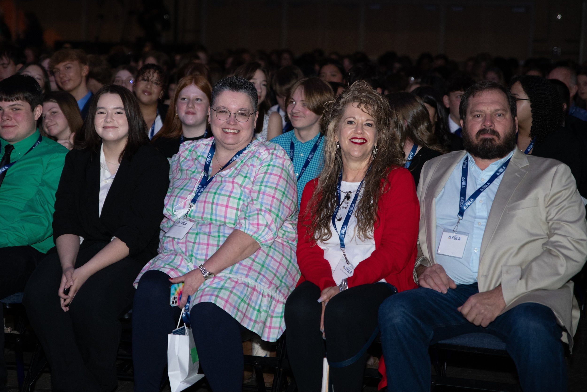 Several FBLA advisors sit in the audience of the Opening Session at the State Leadership Conference.