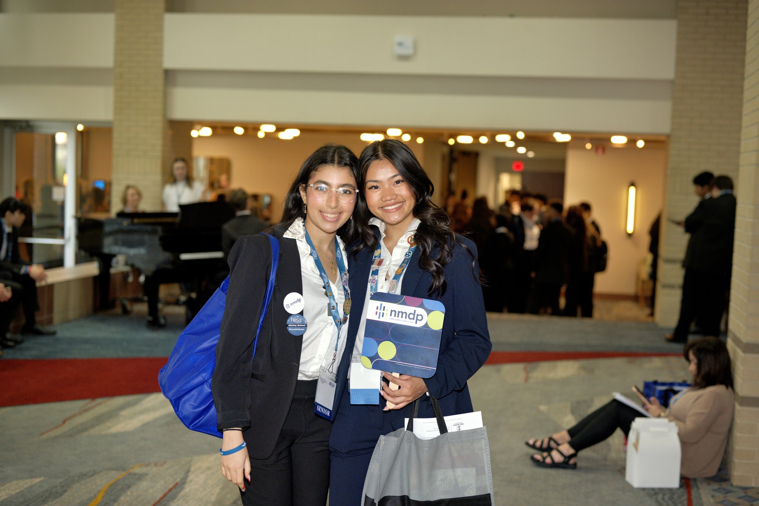 Two HOSA members participate in a sponsored program.
