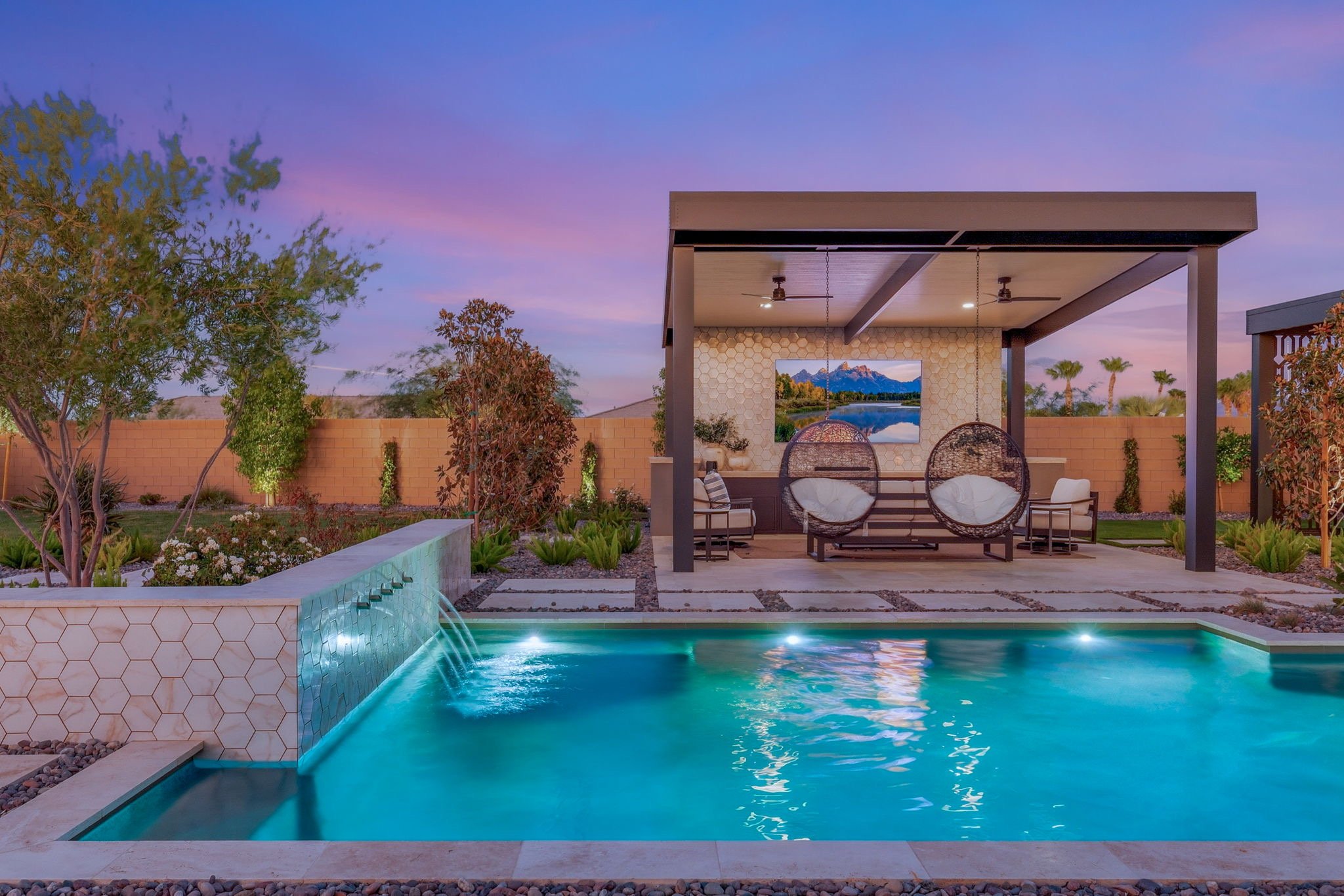Custom Pool with waterfall feature and gazebo. Landscape Design Las Vegas Luxury