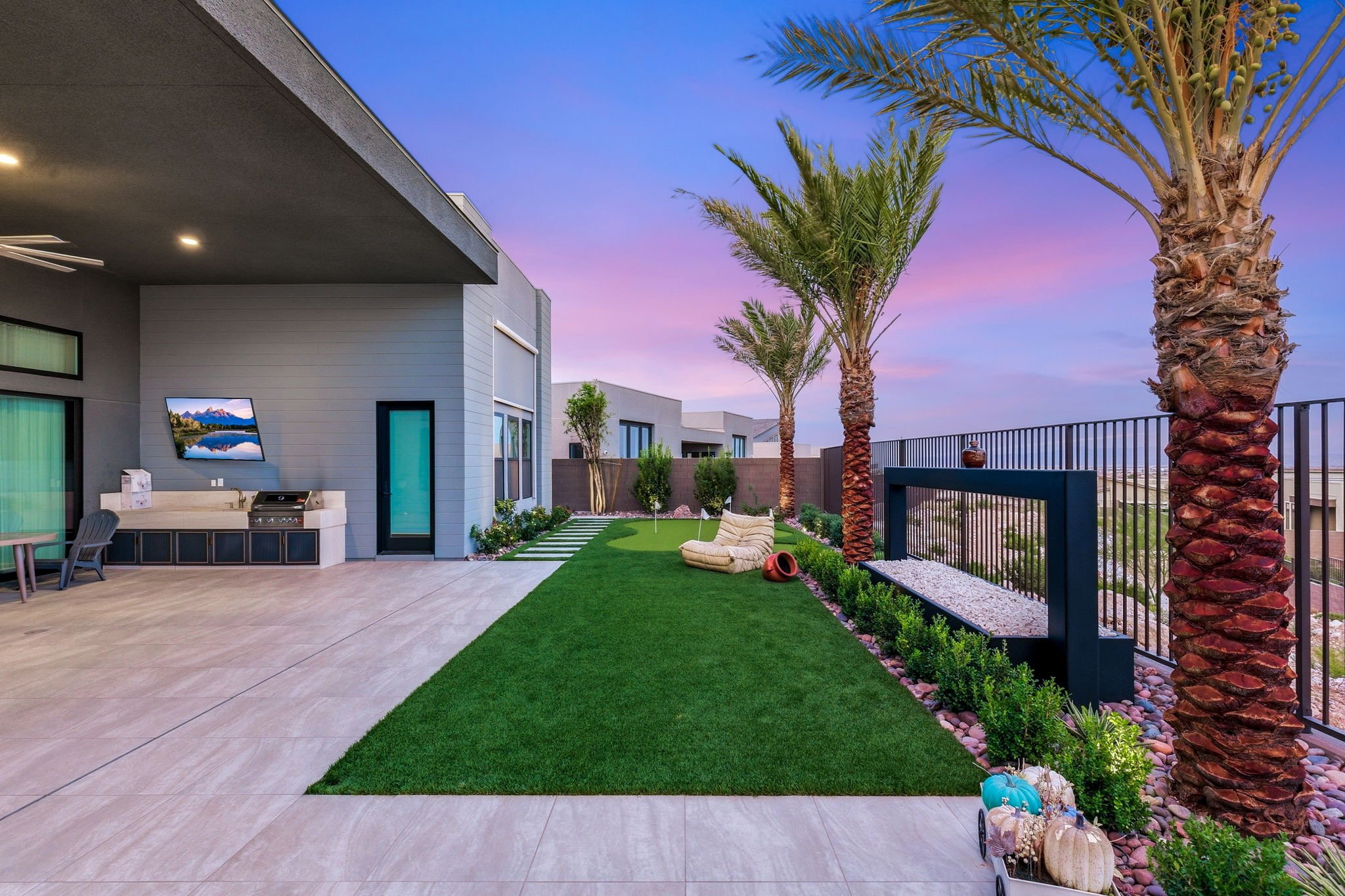 Turf Installation with mini golf course backyard las vegas landscape design