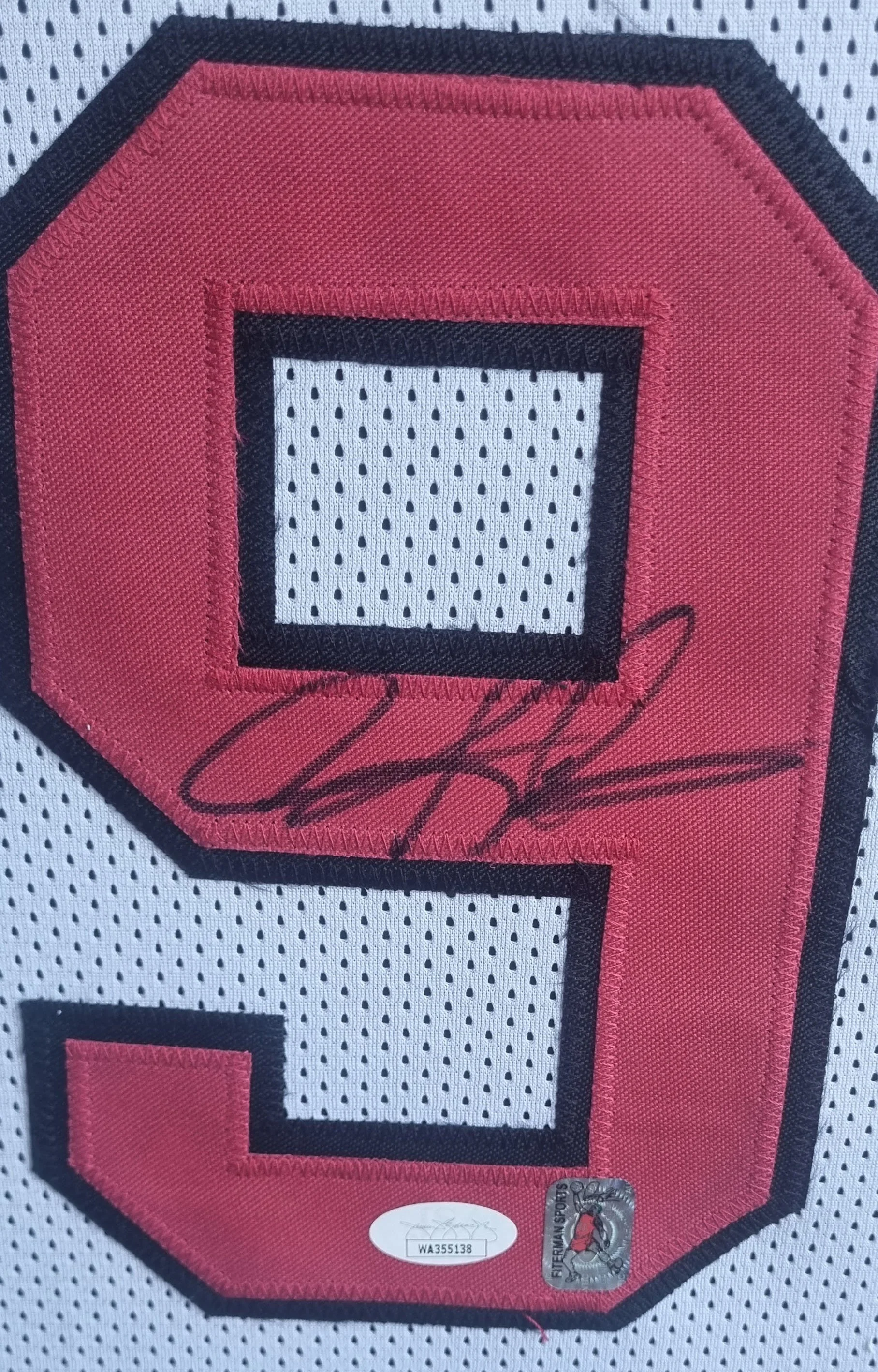 Rodman Bulls White Jersey Autograph.jpg