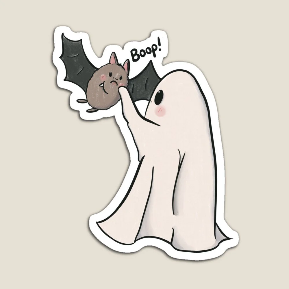 A cartoon ghost with big black eyes and pink cheeks reaching out to touch a cute bat with a round face, pink cheeks, and small ears. The bat has black wings and a sad expression with a speech bubble saying "Boop!"