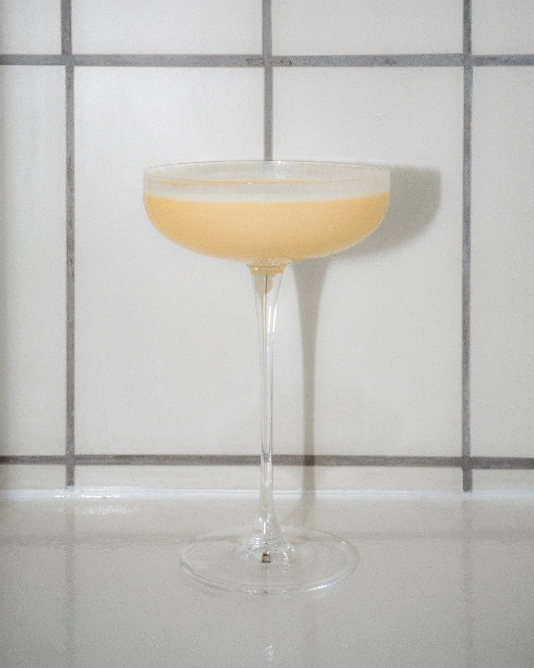 Golden Cadillac Twist. Smooth, creamy, a little indulgent. The kind of cocktail that feels like something you'd spot on the table in a classic 80s movie bar scene.