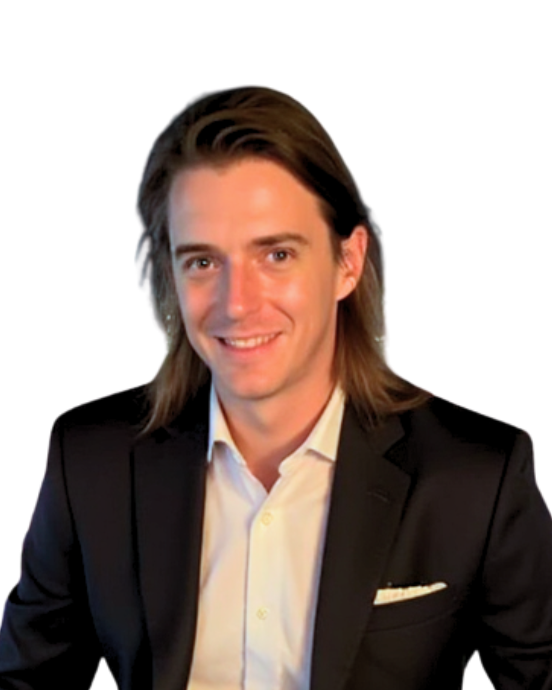 A smiling man with shoulder-length brown hair, wearing a black suit jacket and a white dress shirt, against a plain white background.