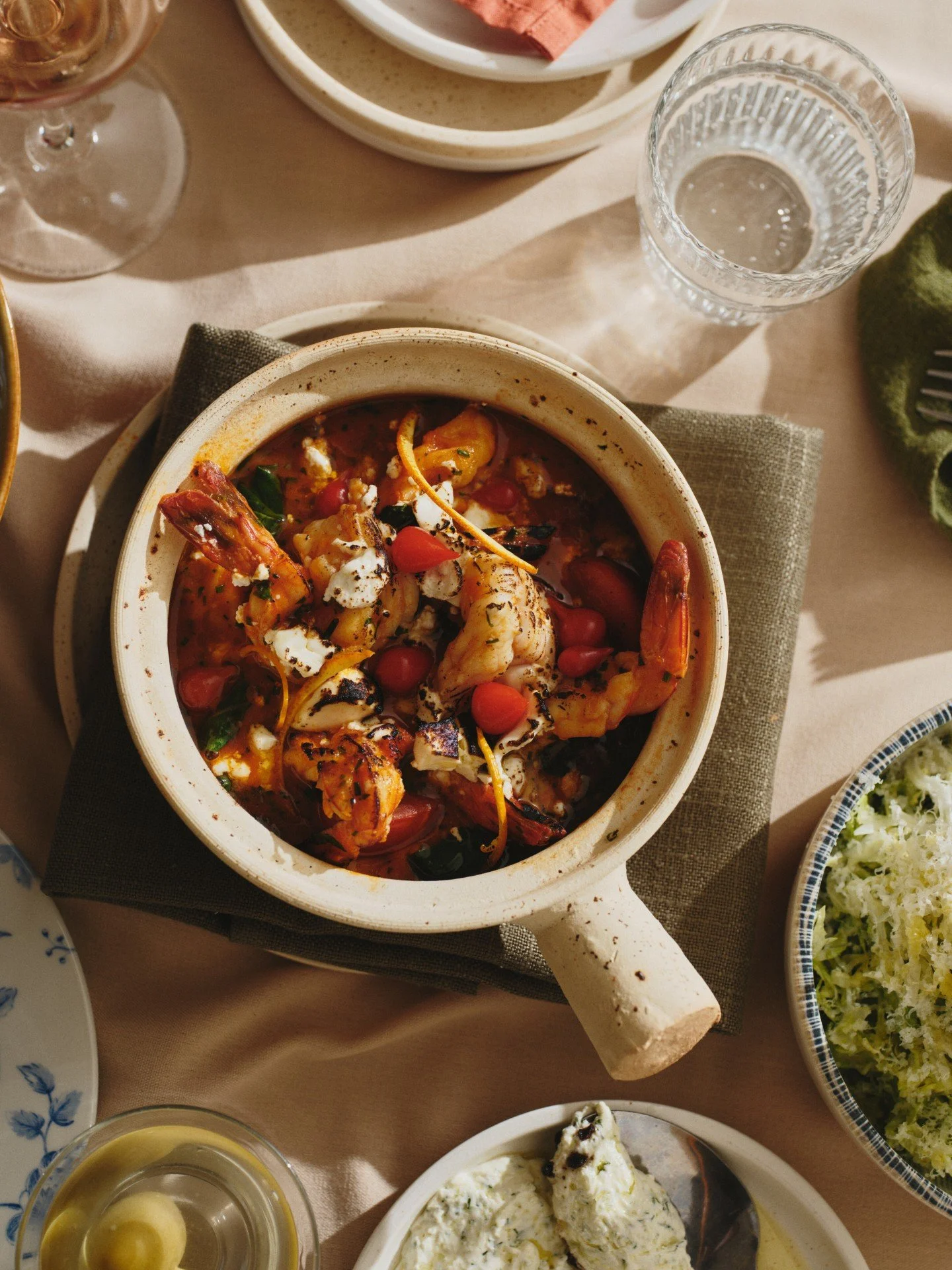 On the table: Garides Saganaki, a dish that&rsquo;s bright, rich and unapologetically Greek.