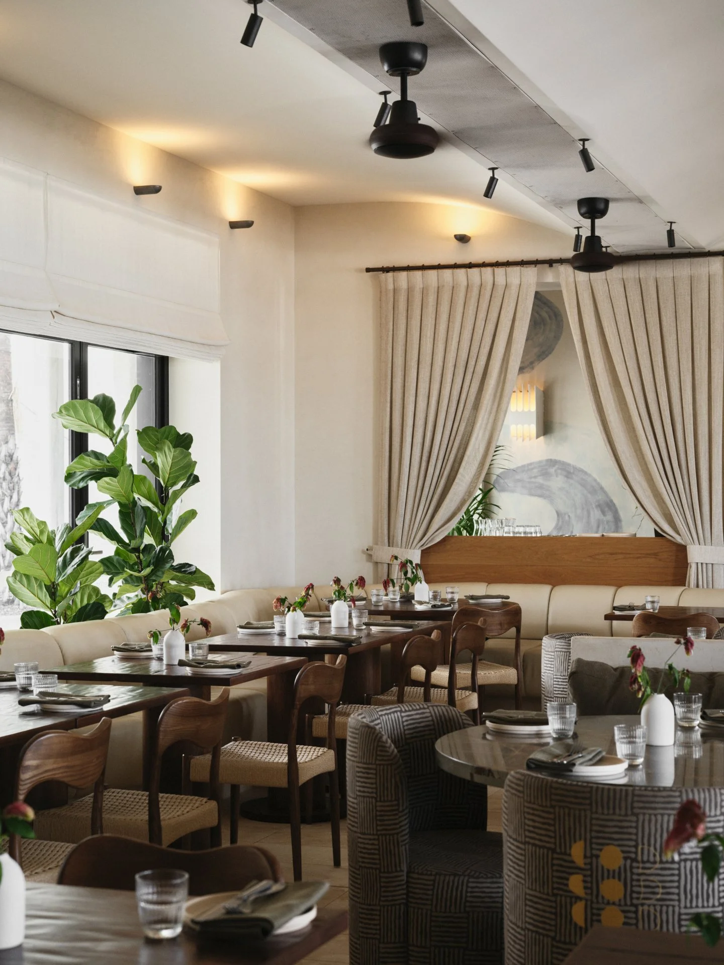 A soft-lit space by the beach, Etheus is your Mediterranean escape without the passport.