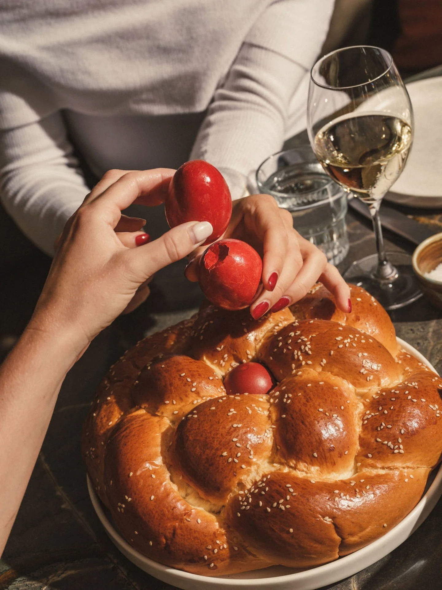 Greek Easter, this Sunday. 

Red eggs cracked. Glasses raised and the table set for a long lunch. 

A few tables left. Book your table now.