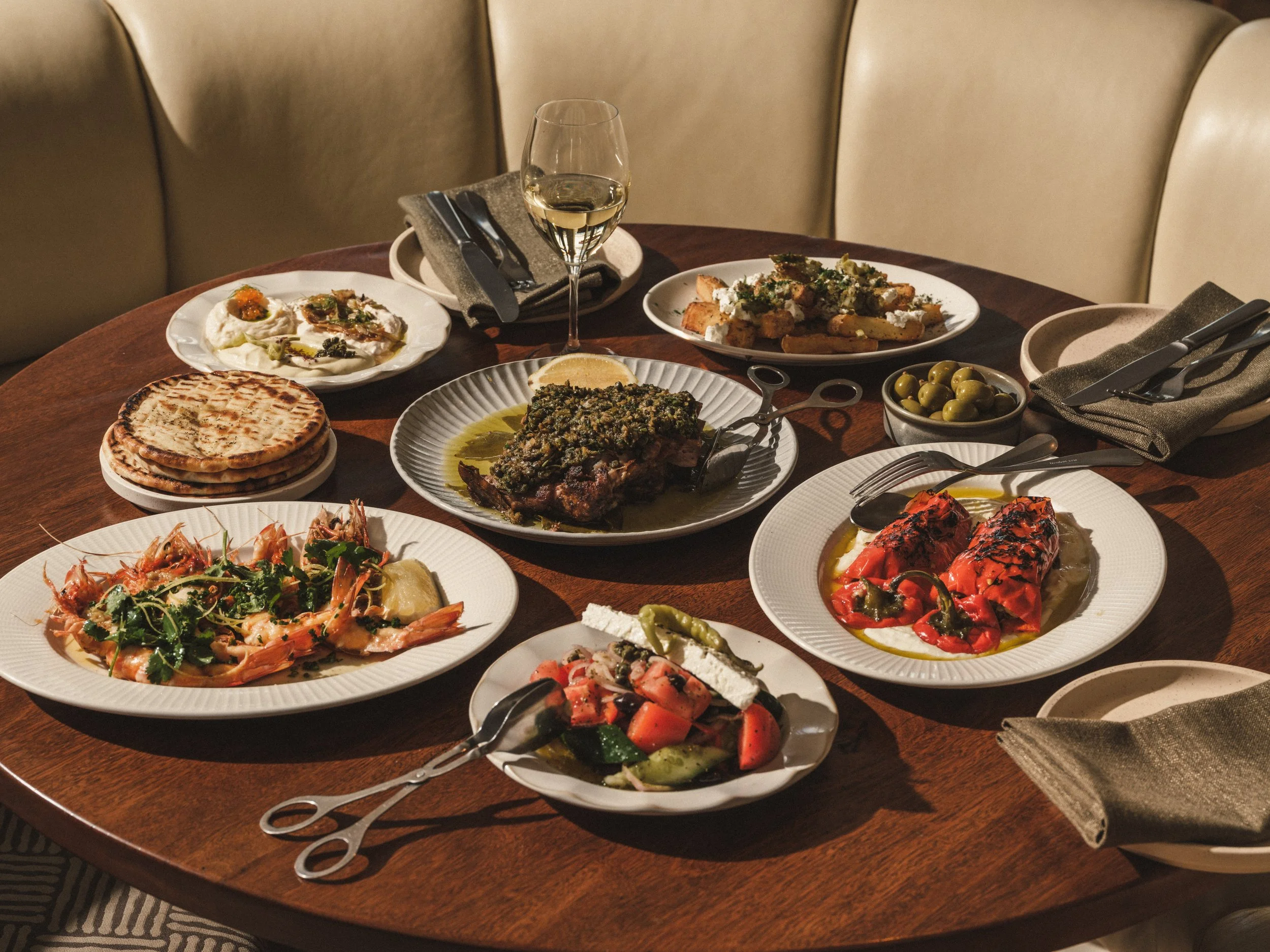 Greek festive banquet dishes on the table at Etheus