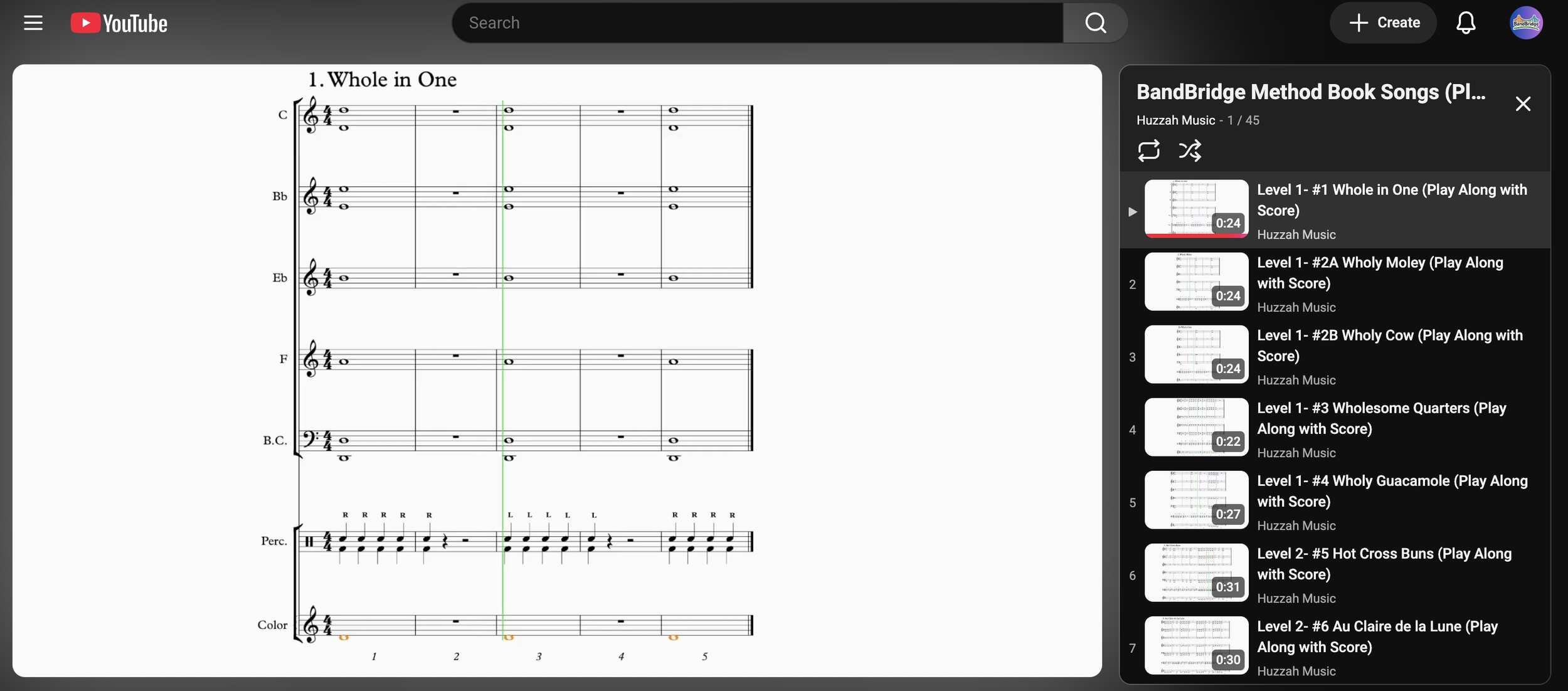 Screenshot of a YouTube video page showing sheet music titled 'Whole in One' with multiple musical staves and notation, along with a sidebar of related pages and videos for BandBridge Method Book Songs.