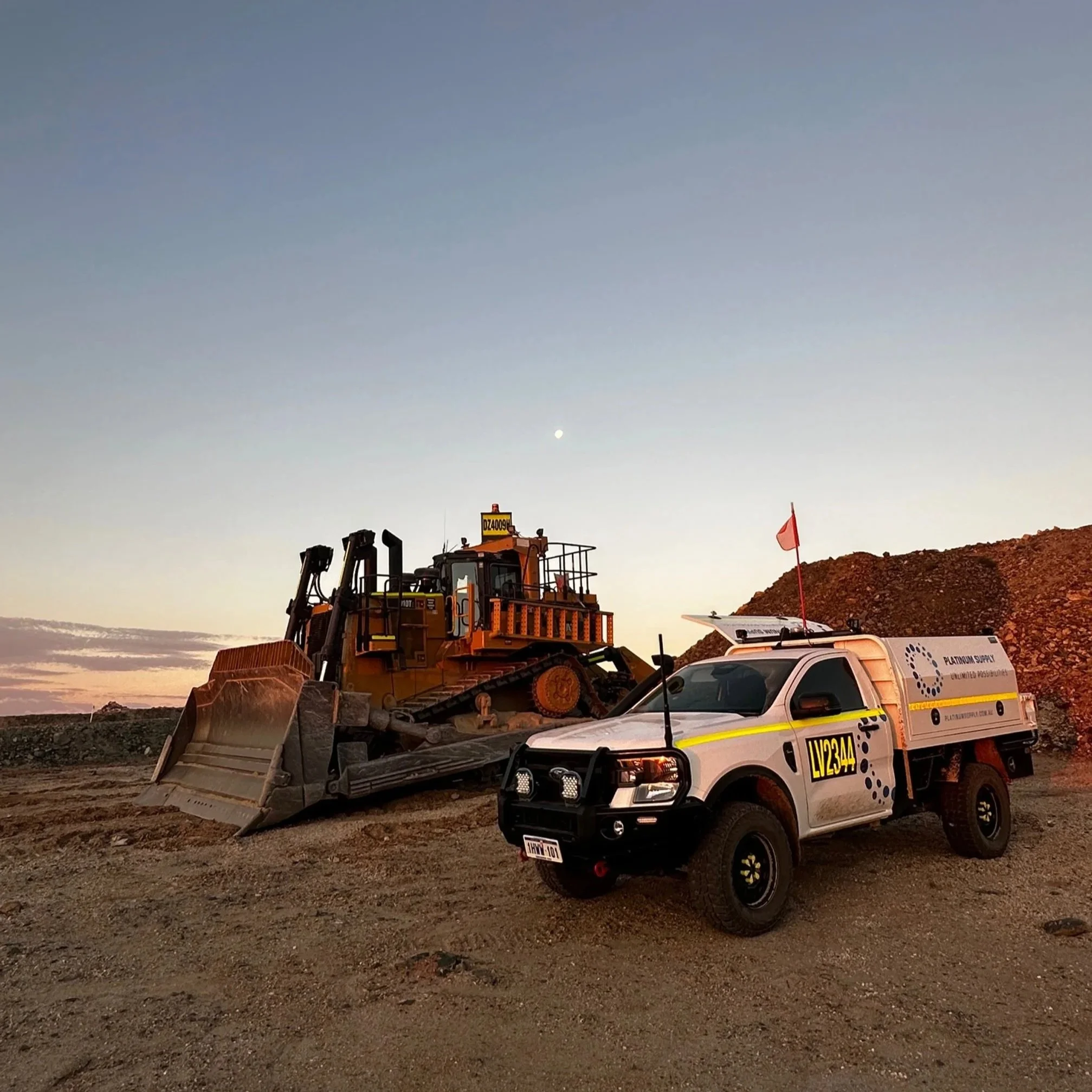 Platinum Supply Service Vehicle servicing a Bulldozer