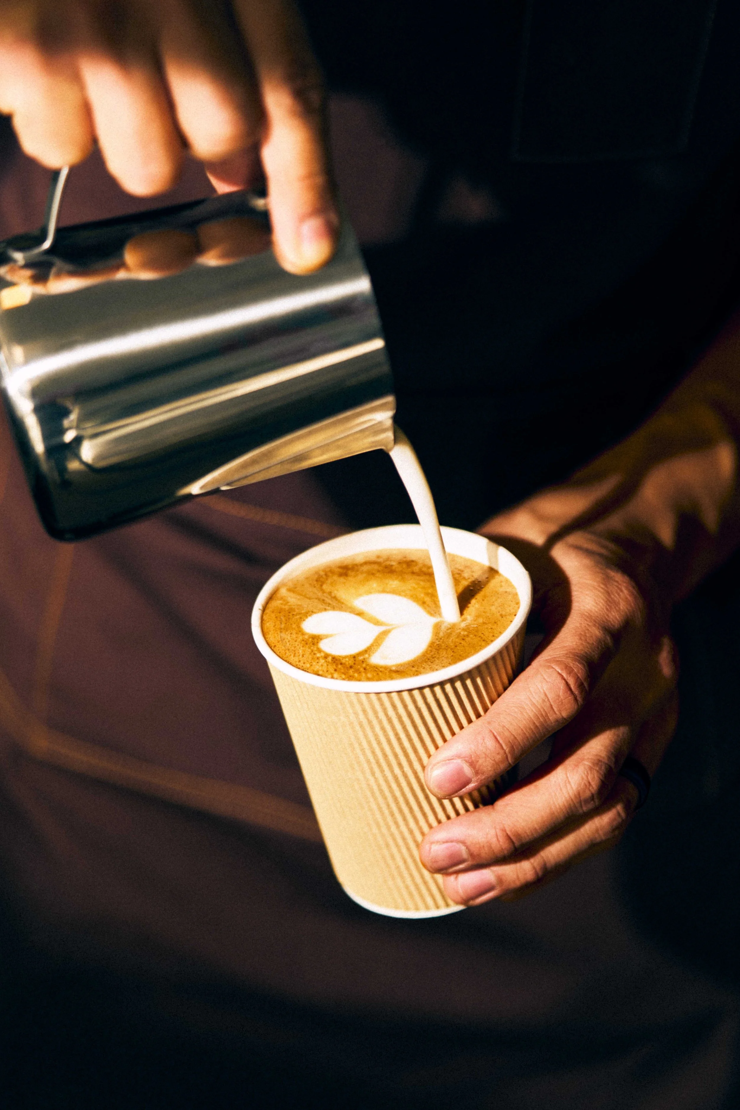 ocho barista making latte art