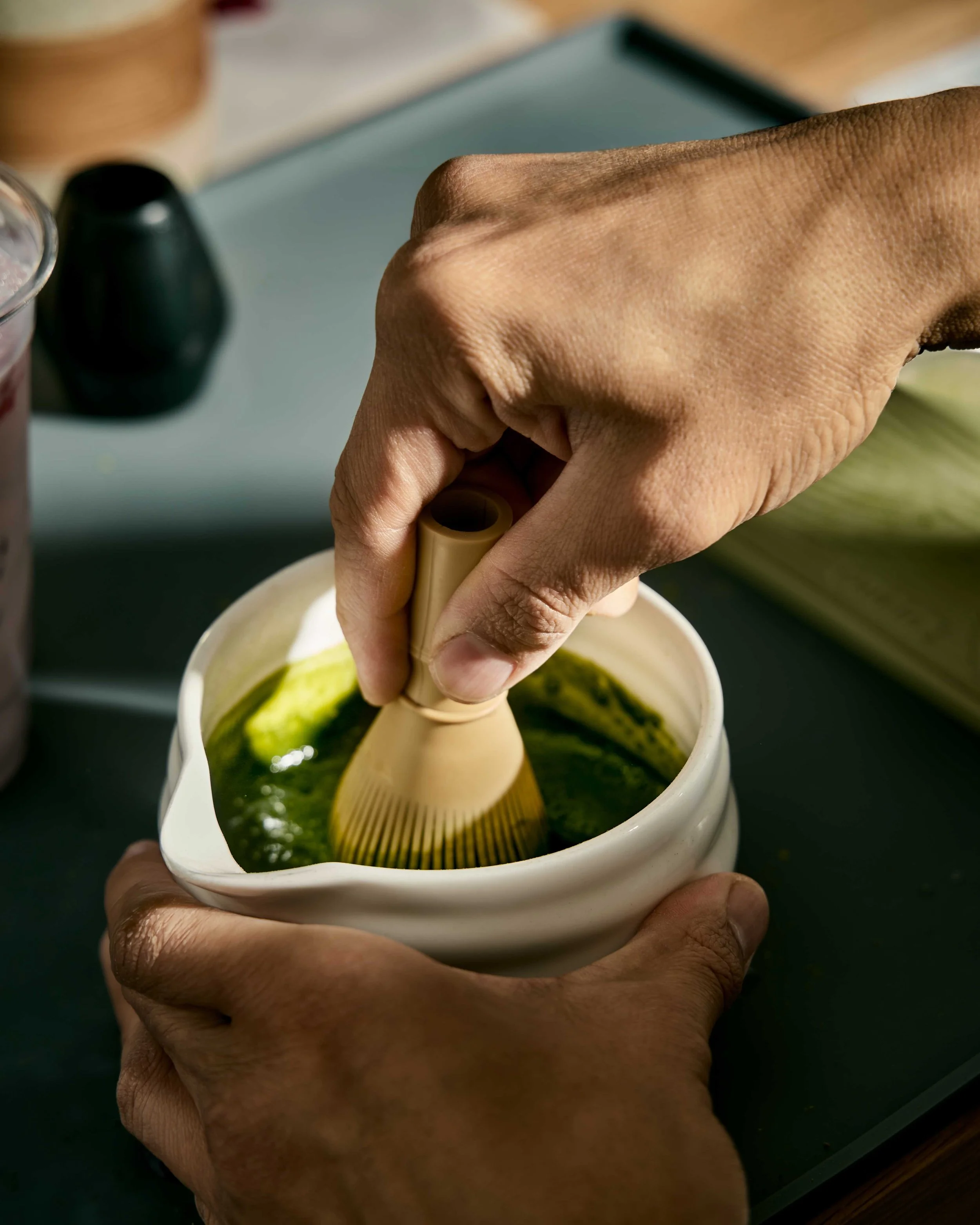 ocho matcha being whisked