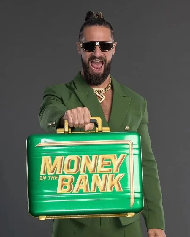 seth-rollins-money-in-the-bank-photoshoot-v0-l6ycpiv3b68f1.jpeg