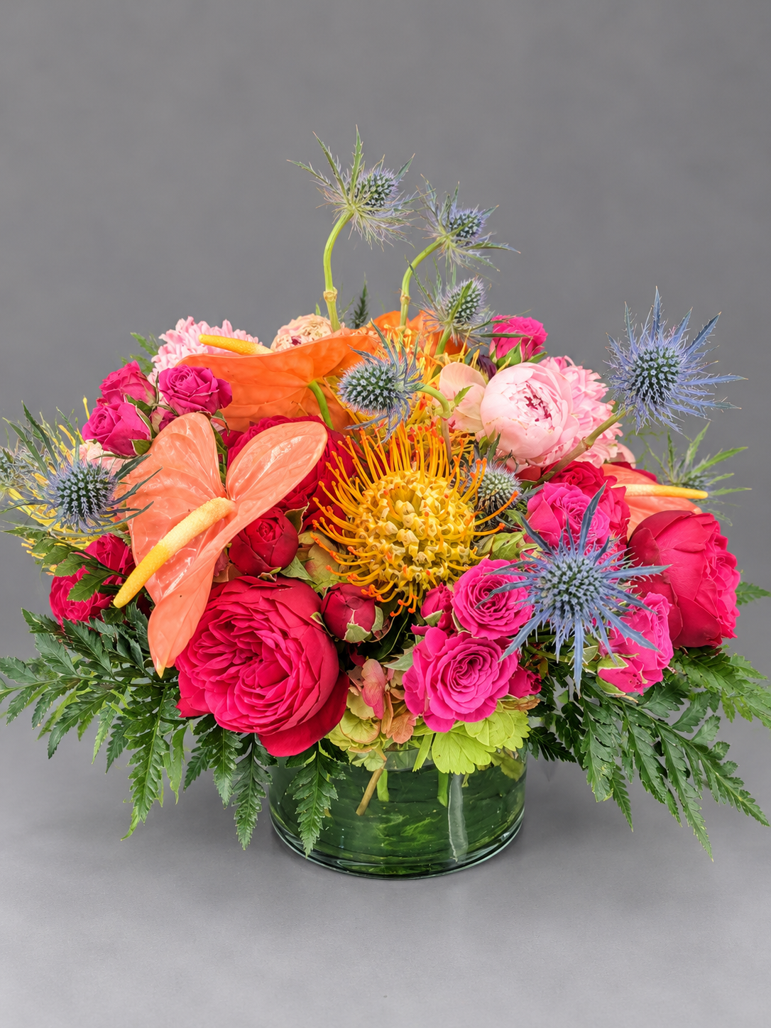 Vibrant Mixed Flower Bouquet in Glass Vase.png