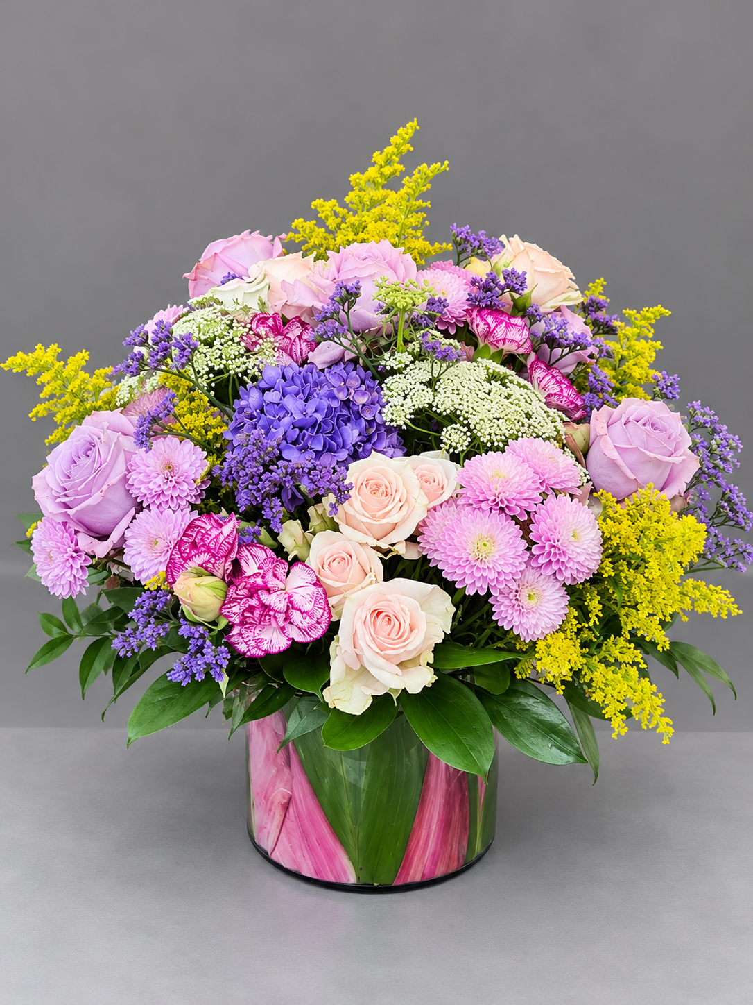 Pastel Garden Bouquet in Leafy Vase.png