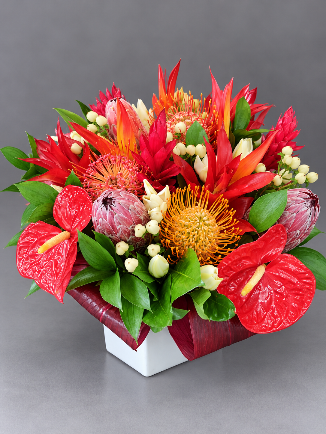 Vibrant Tropical Protea Centerpiece.png