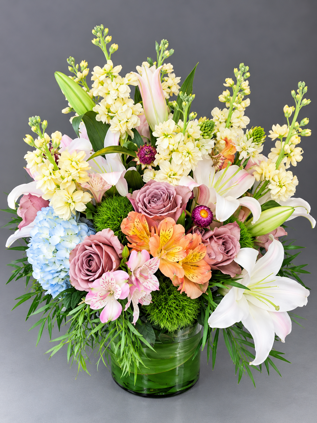 Lush Pastel Garden Bouquet in Green Vase.png