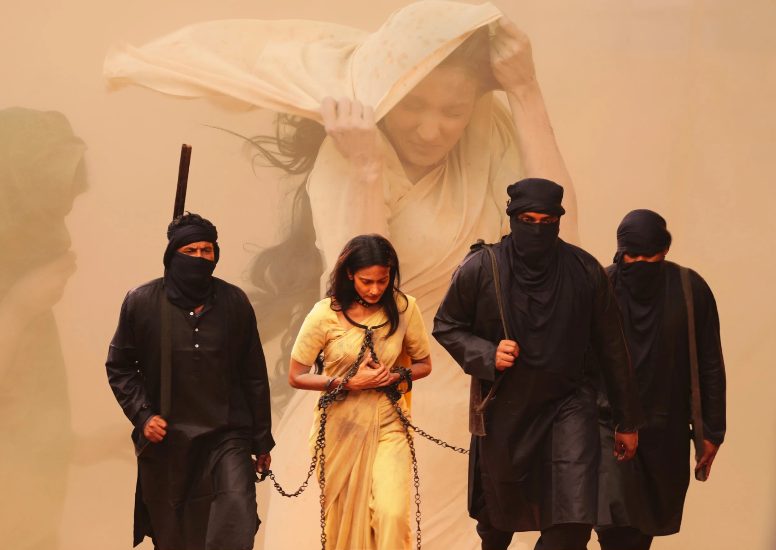 A woman with long dark hair looking to the right against a dark, textured background, wearing a yellow top.