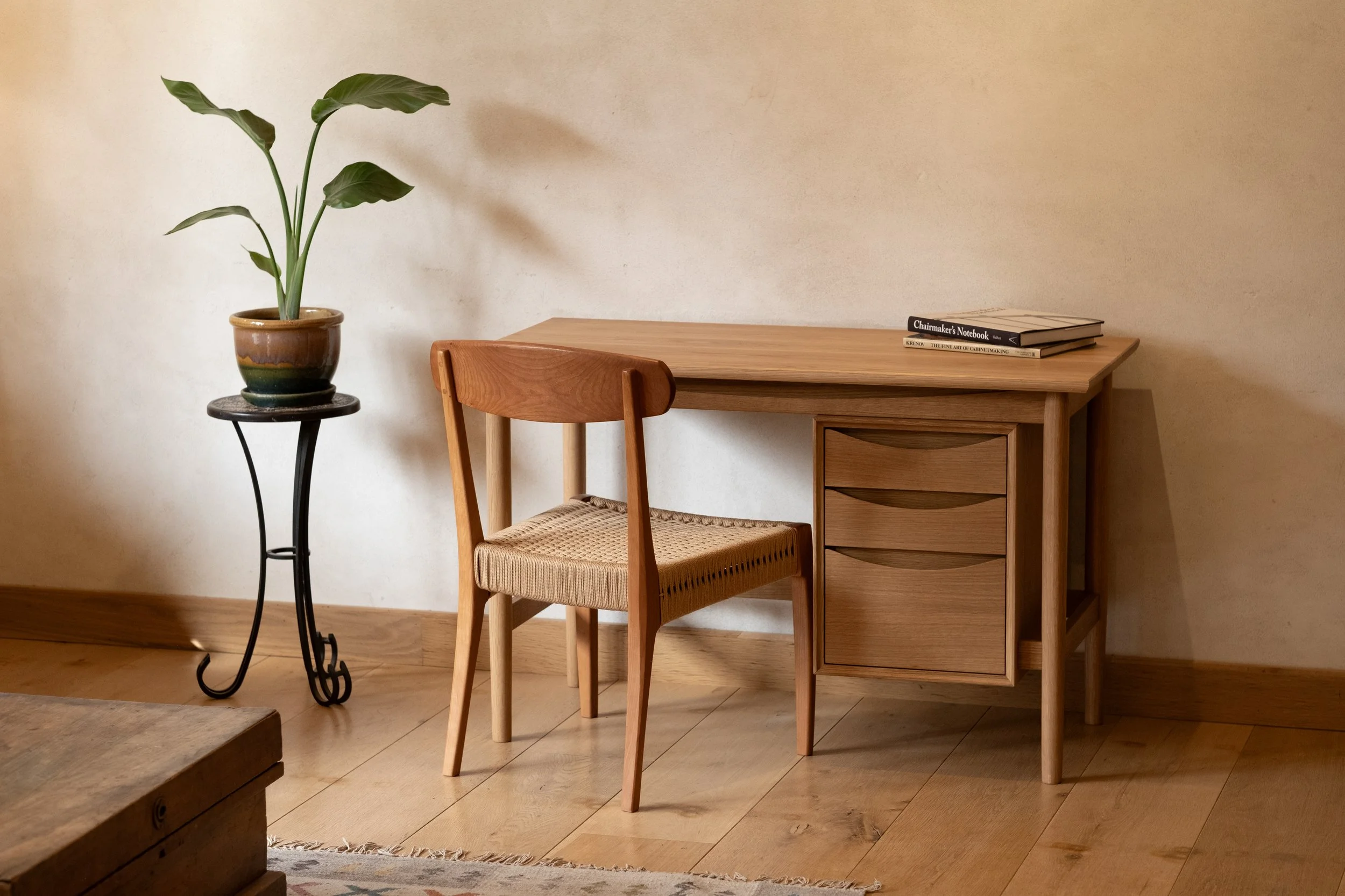 Wren Desk with wishbone chair and potted plant, Pacific Northwest home office