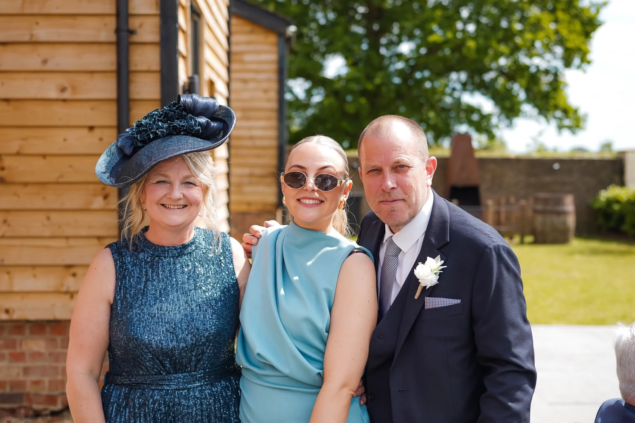 Mother of the groom looking amazing in her bespoke headpiece