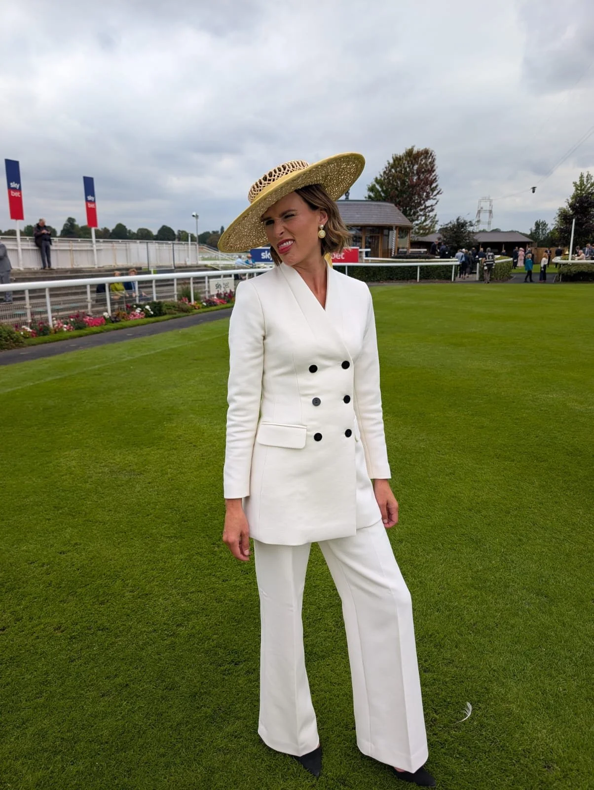 Francesca Cumani looking amazing in a large twisted raffia boater at York