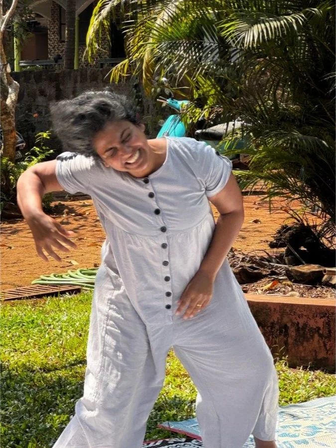 Creative body movement session at The Art Farm, India. people practicing dance outdoors. 