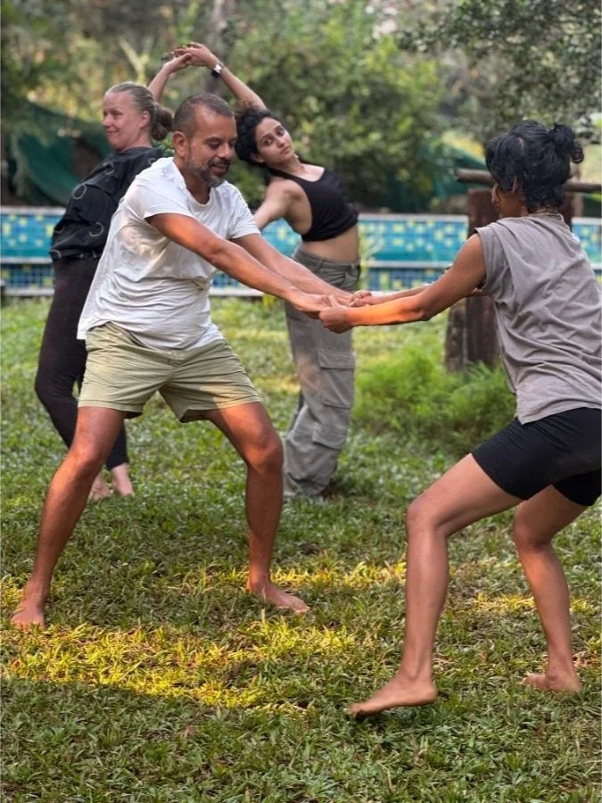 Guests engaged in contemporary dance and movement exploration at The Art Farm, Goa - community workshop in nature.