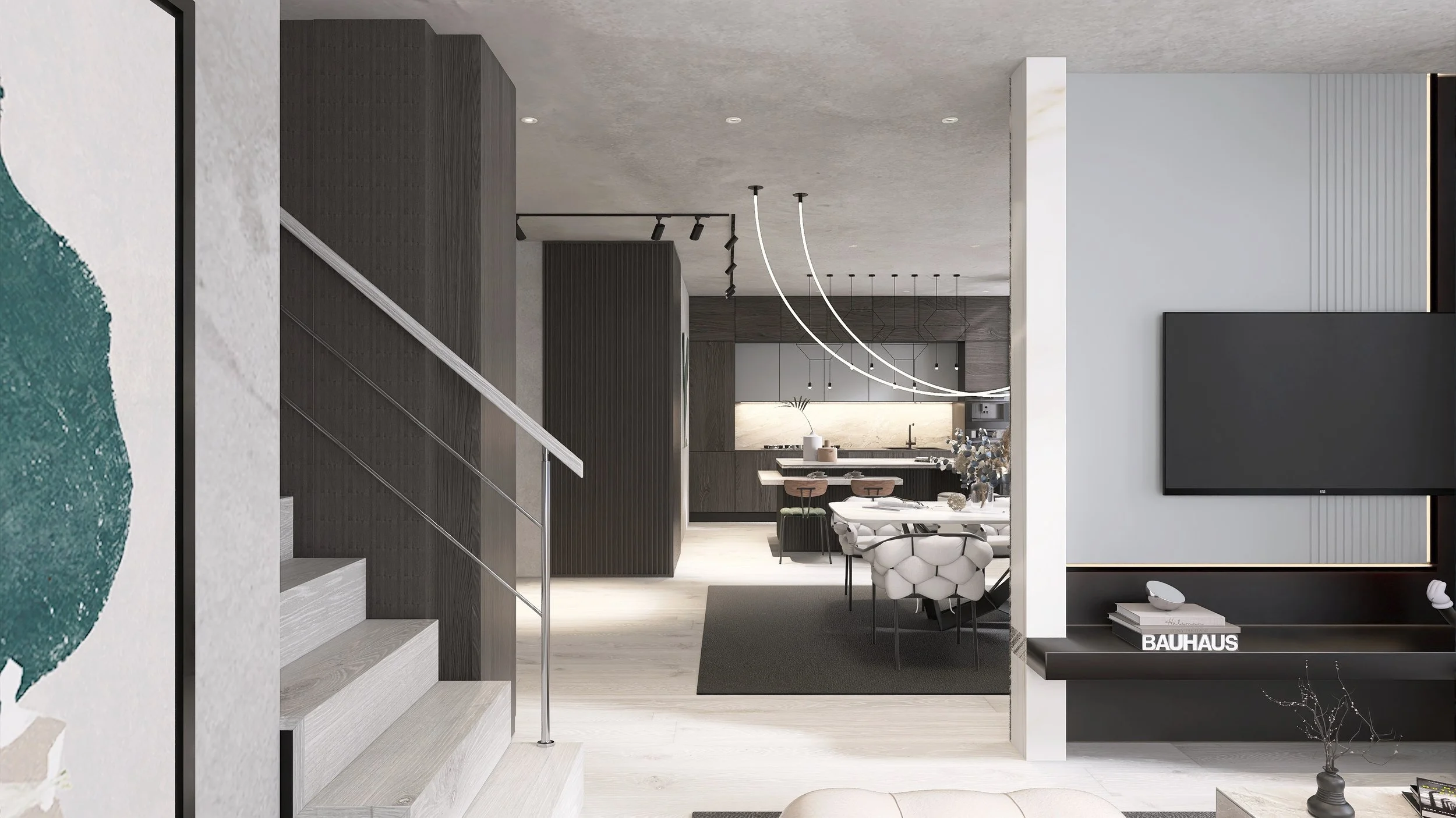 Moderner Innenraum einer offenen Wohnküche mit Essbereich, dunklen Holzoberflächen, weißen Wänden und moderner Beleuchtung, im Vordergrund eine Treppe mit Metallhandlauf.