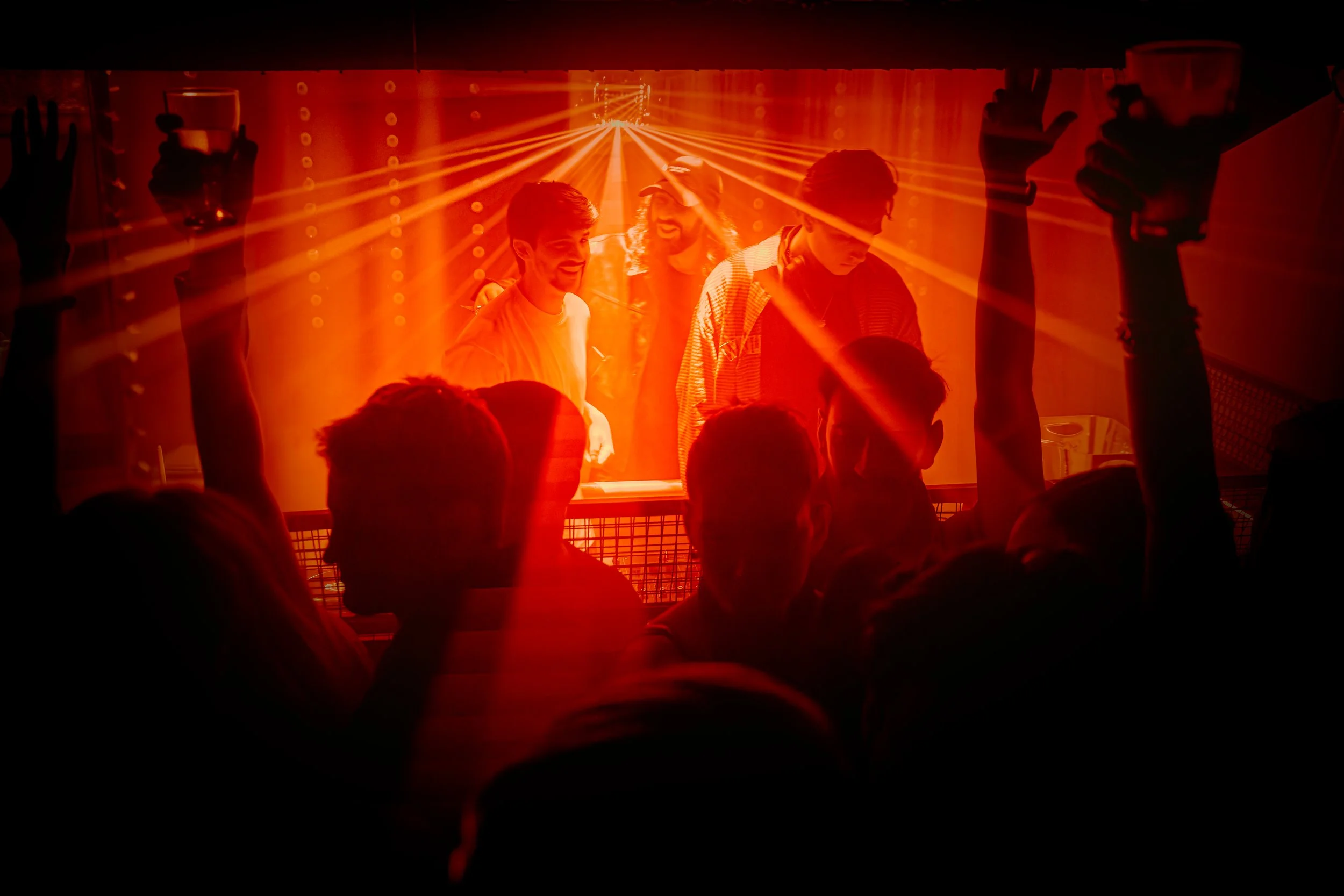 the lazers and lights at the nightclub in kensington whilst the dj plays