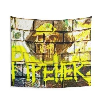 Graffiti art of a smiling man wearing a yellow hard hat, with yellow spray-painted text 'TYPERHEK' below.