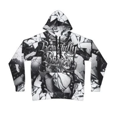 Edgy black streetwear pullover hoodie featuring the custom Beautifully Broken graphic text layout.
