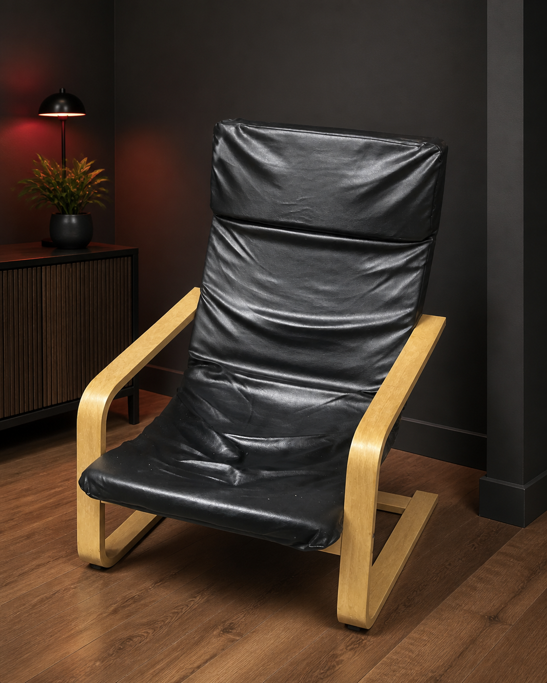 Black faux-leather bentwood lounge chair