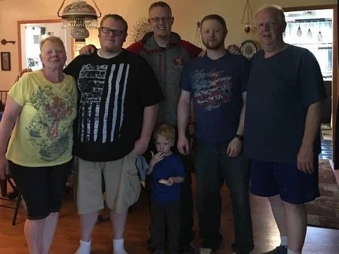 12-jackie-mark-and-family.jpeg
