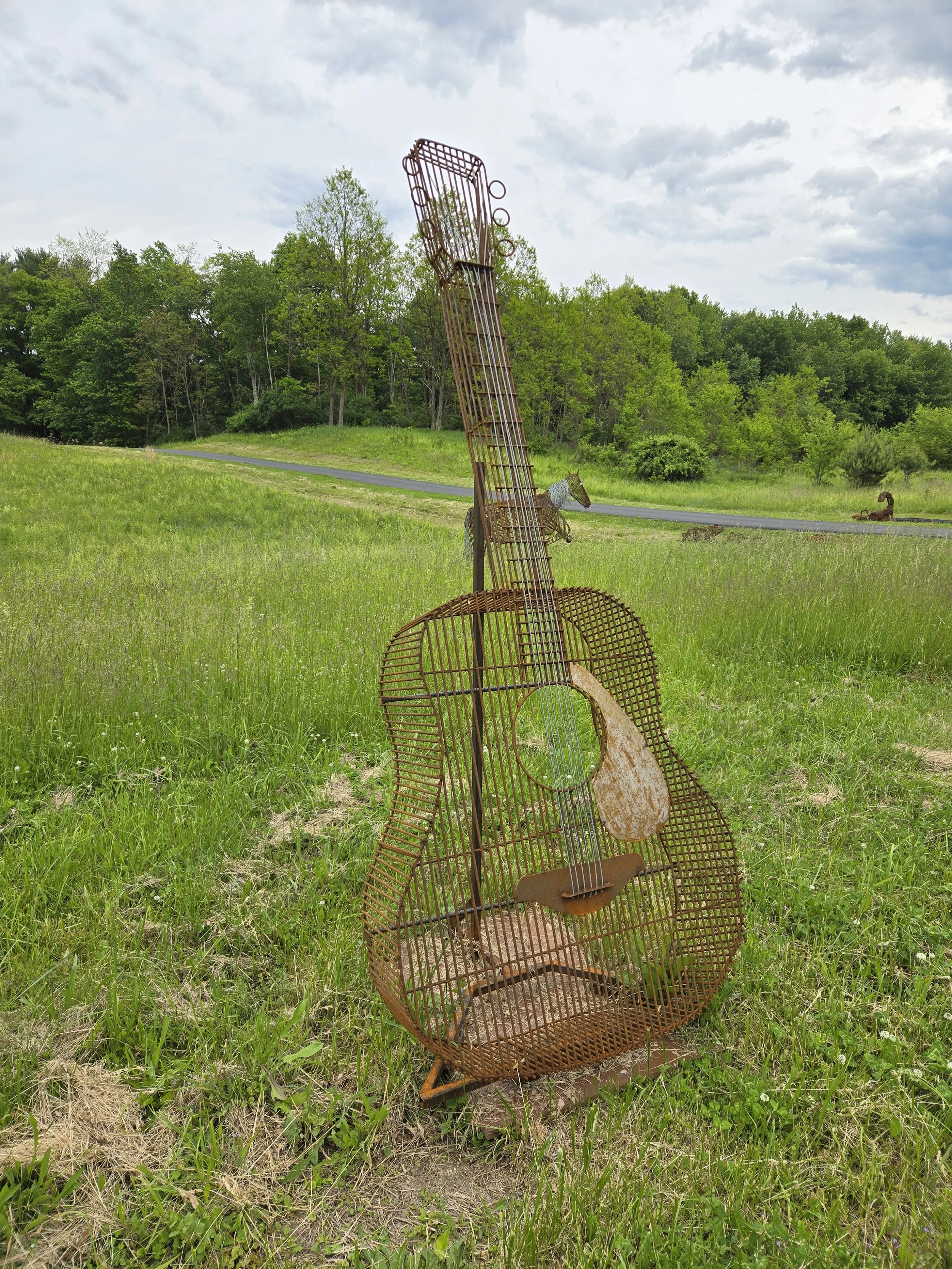 Acoustic Guitar
94" x 40"
$2600