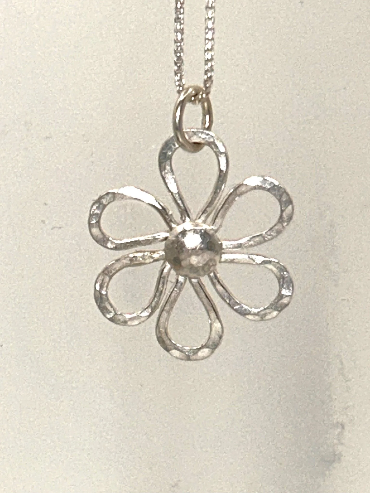 Medium Sterling Silver Daisy Pendant: (16” silver chain)