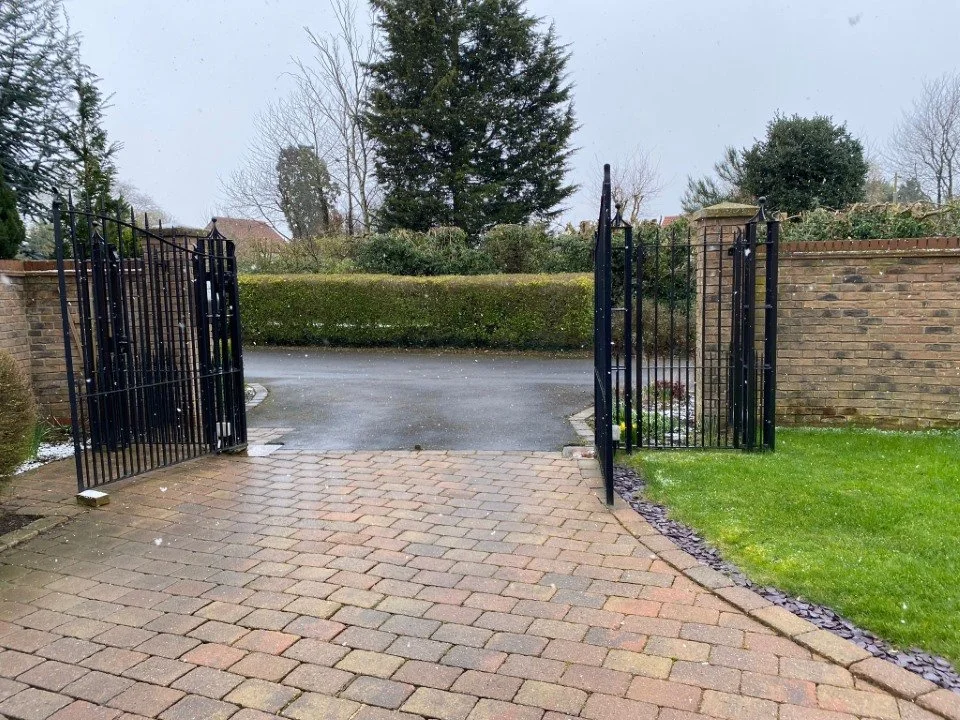 Open wrought iron gate.jpg