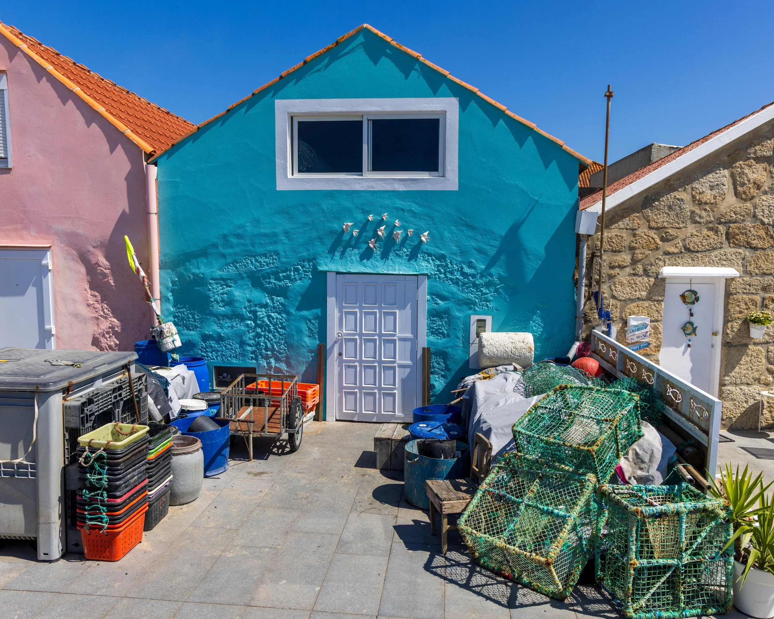 We came to a small fishing village.  There were about a dozen small huts like these and every type of fishing paraphernalia you can name strewn everywhere.  It was like a random small community in the middle of empty coastline. 