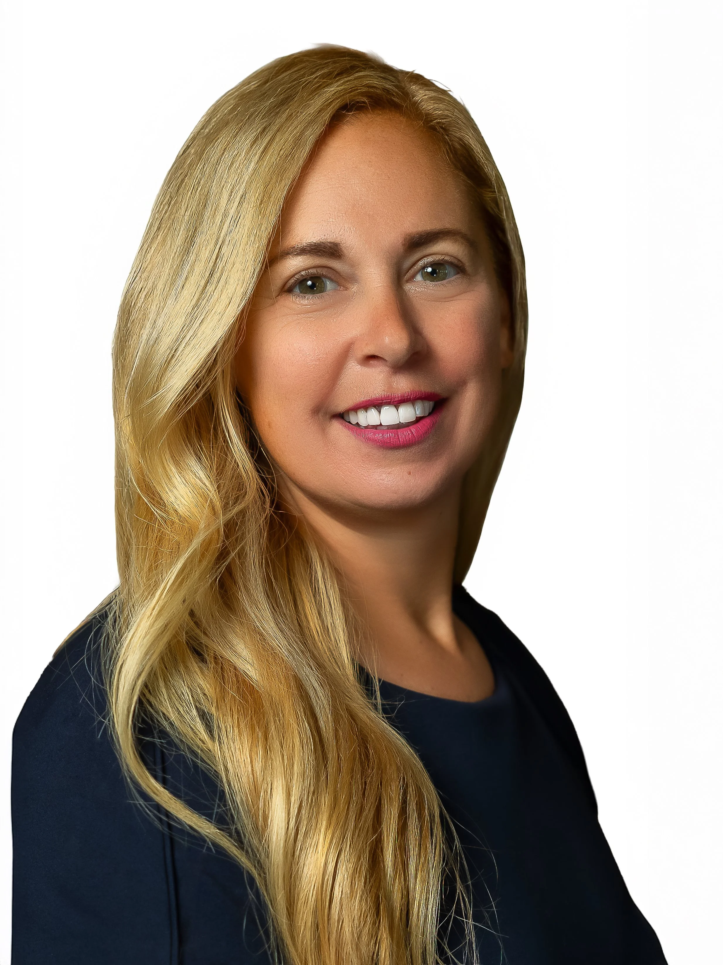 Woman with blonde hair and fair skin smiling at camera