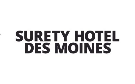Text logo reading 'Surety Hotel Des Moines' in black font on a white background.