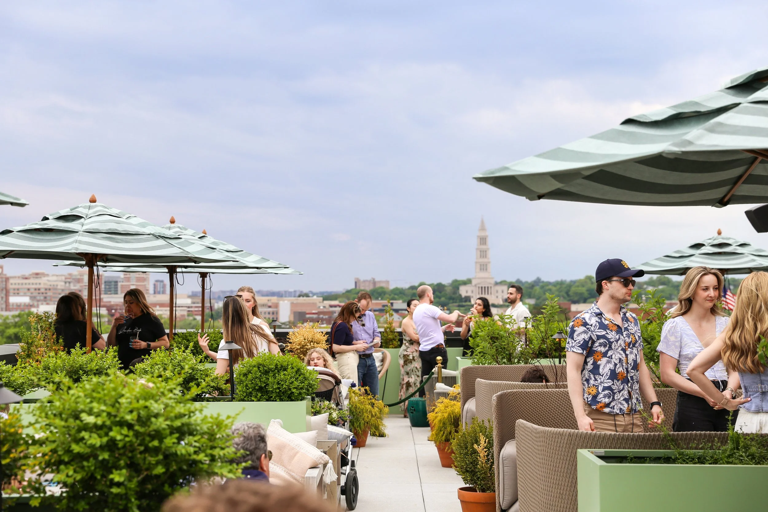 People at Good Fortune rooftop at Hotel Heron in Alexandria, Virginia