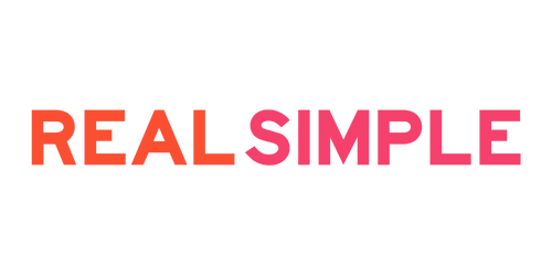 The words 'REAL SIMPLE' written in bold, colorful letters with 'REAL' in red and 'SIMPLE' in pink.