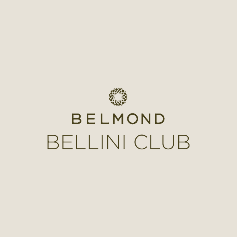 Logo of Belmond Bellini Club with a stylized circular emblem above the text on a light background.