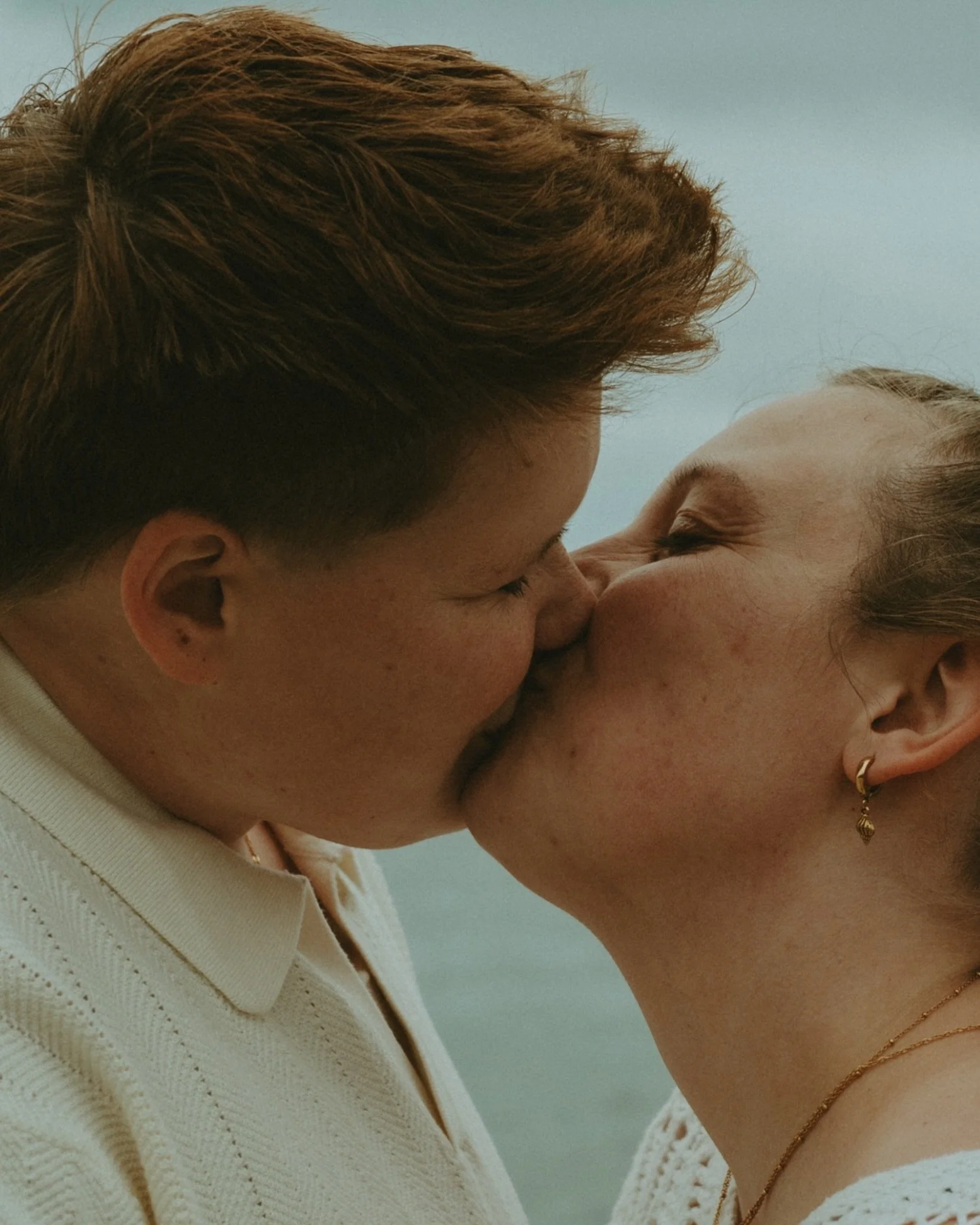 THEY SAID YES! 💍 When Kaleb reached out to me wanting to book surprise proposal photos and engagement photos I was soooo stoked! They planned to do it at Rissers Beach, where I had to hide so Bri wouldn&rsquo;t notice me (or all of their friends tha