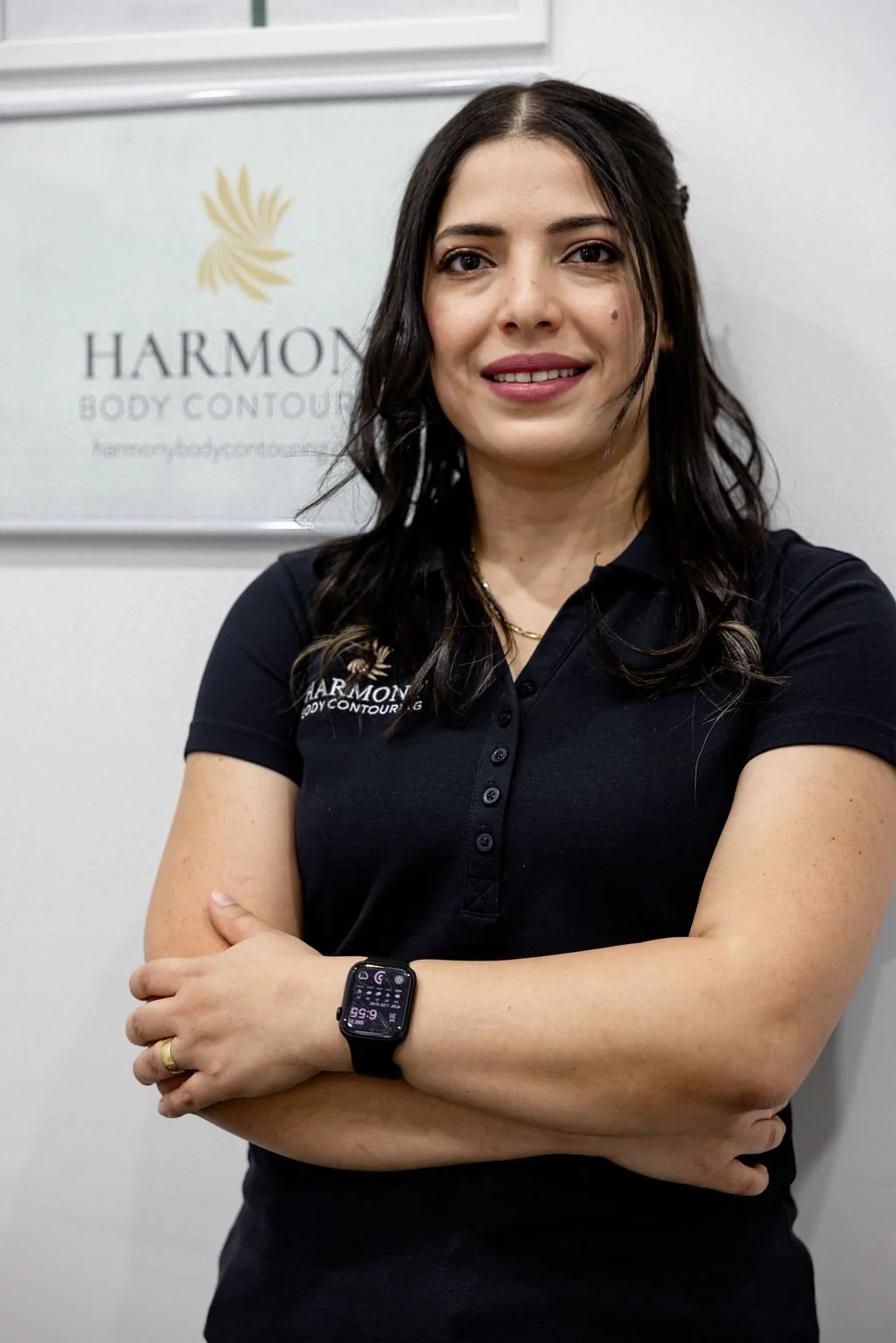 Smiling woman wearing brown dress