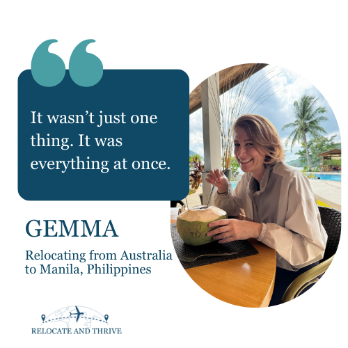 A woman sitting at a table outdoors, smiling, drinking from a coconut. The background shows palm trees and a pool, indicating a tropical setting.