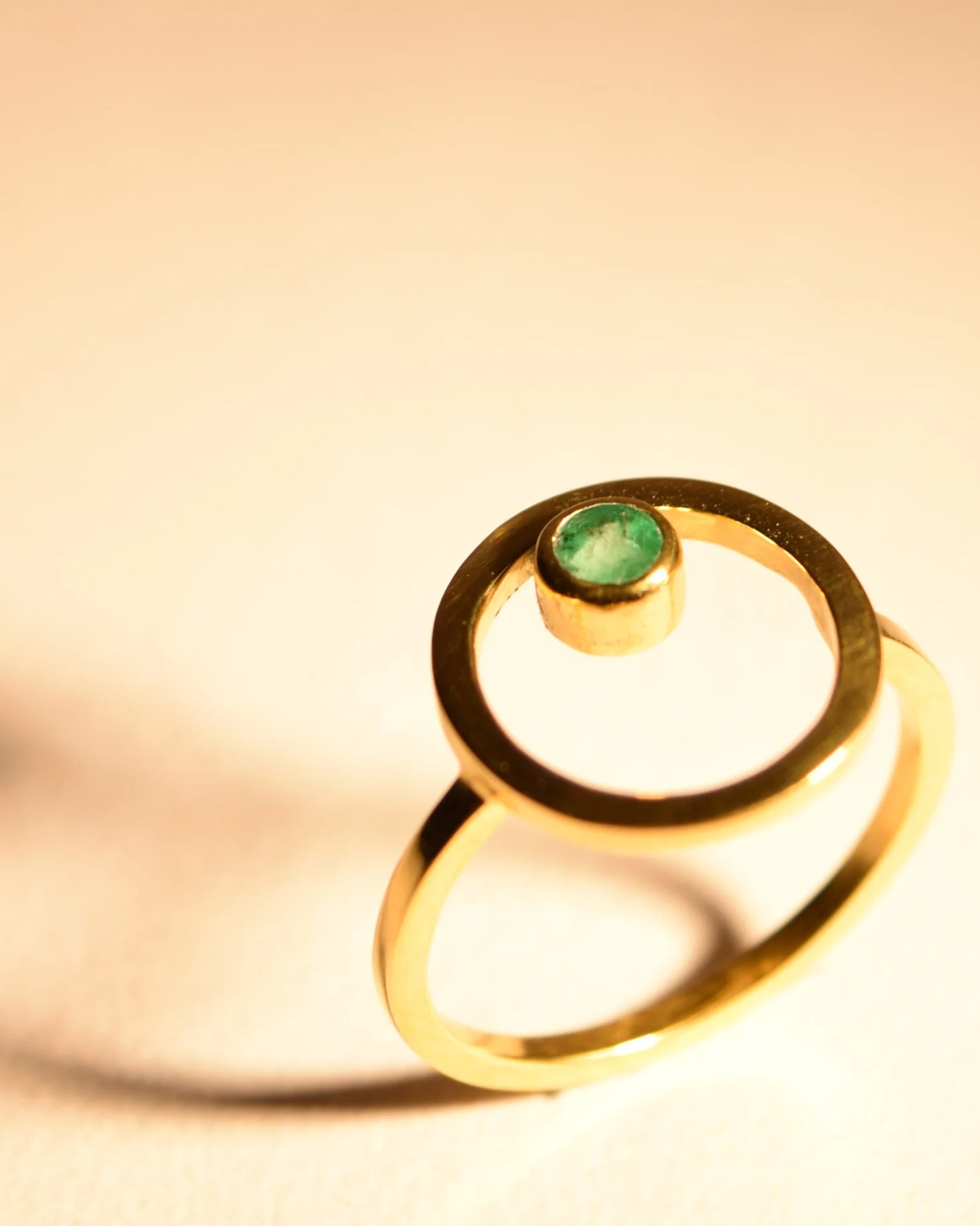 gold+belak+ring+emerald.png