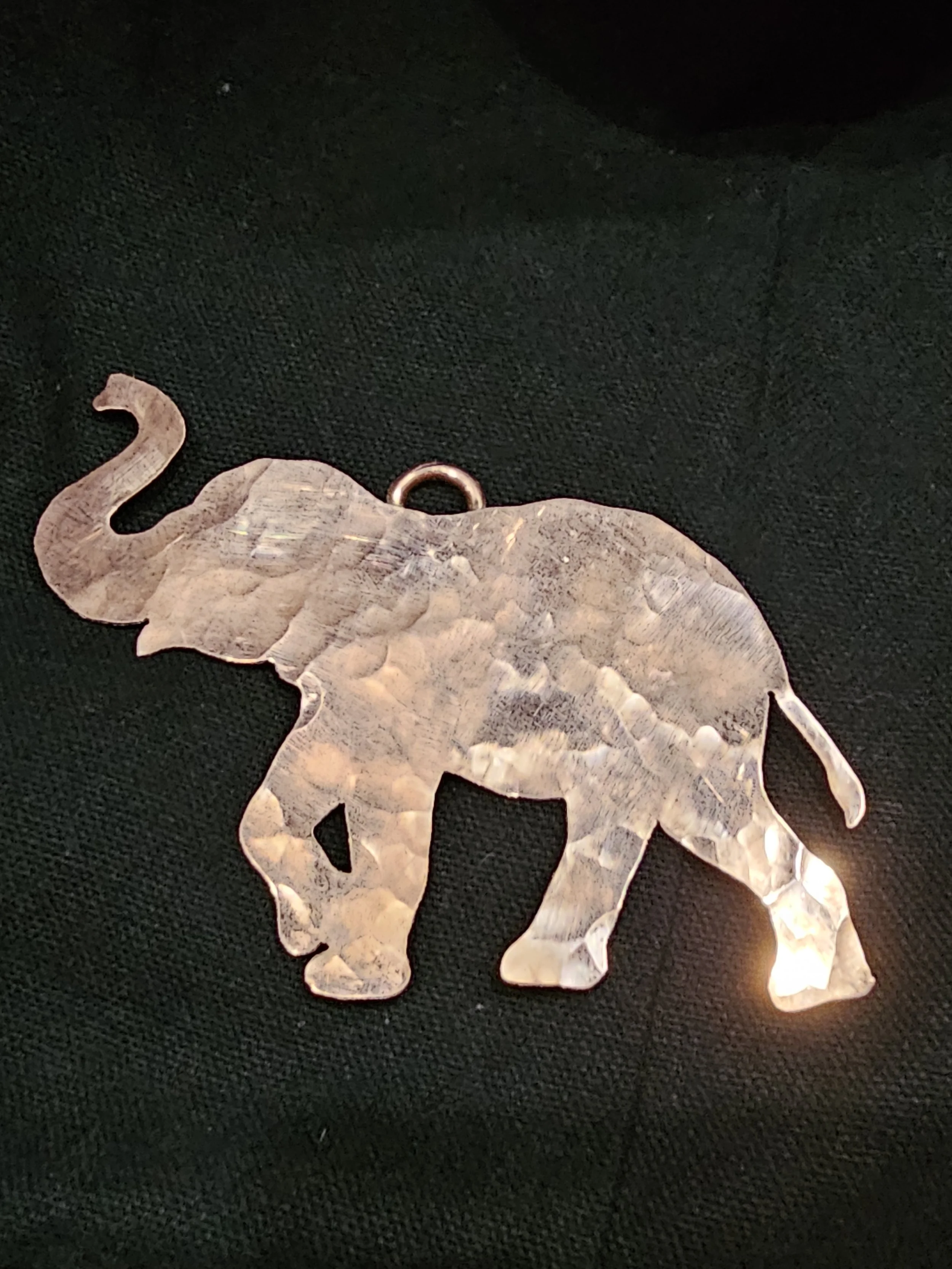 BCKW product image of a copper ornament in the 2D shape of an elephant