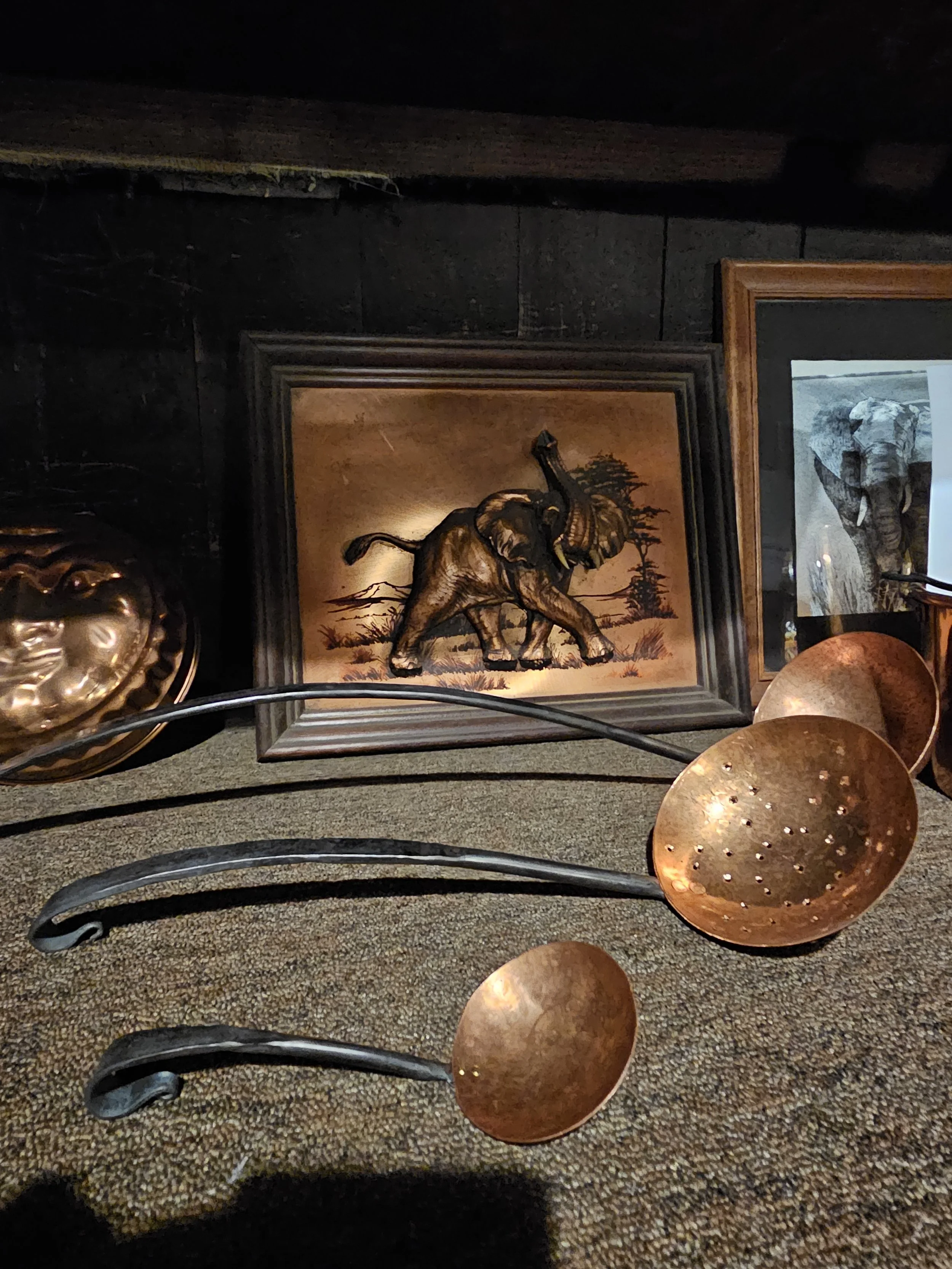 BCKW product image of various sized copper ladles with iron handles